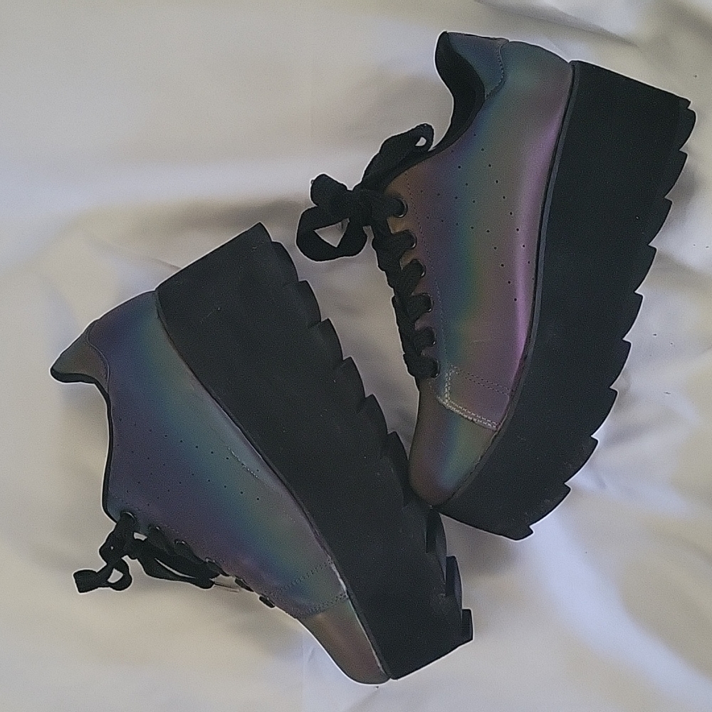 YRU gray reflective platform sneakers.